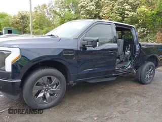 2023 Ford F-150 Lightning Pro with VIN 1FTVW1EL7PWG11924, listed as a IAAI auction lot 41991819 with 20,450 mi miles and . Bid and sale history available at DreamBid. Image 6.
