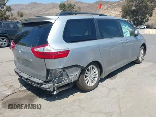 2015 Toyota Sienna XLE with VIN 5TDYK3DC0FS589947, listed as a IAAI auction lot 36567379 with 130,969 mi miles and . Bid and sale history available at DreamBid. Image 4.