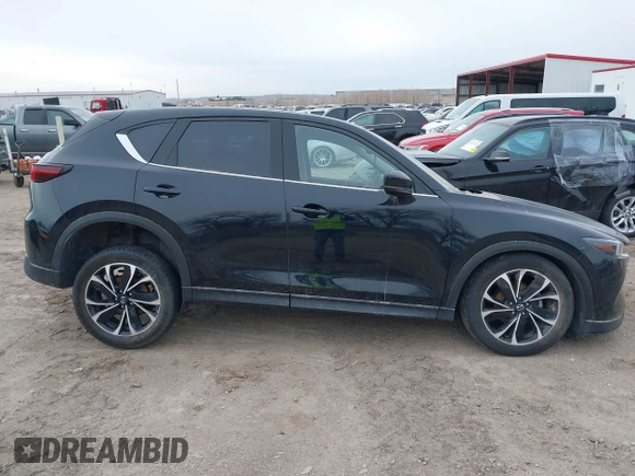 2023 Mazda CX-5 S Premium with VIN JM3KFBDM2P0221973, listed as a IAAI auction lot 41853756 with Not Provided miles and . Bid and sale history available at DreamBid. Image 14.