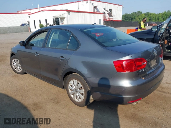 2014 Volkswagen Jetta S z VIN 3VW2K7AJXEM351762, wystawiony jako IAAI lot #42467930 z przebiegiem 159 210 mil mil oraz . Historia ofert i sprzedaży dostępna na DreamBid. Obrazek 3.