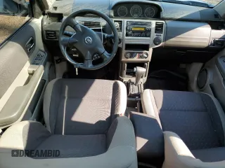 2006 Nissan X-Trail XE z VIN JN8BT08V76W200772, wystawiony jako Copart lot #62078634 z przebiegiem 234 102 mil mil oraz Szkody całkowita. Historia ofert i sprzedaży dostępna na DreamBid. Obrazek 8.