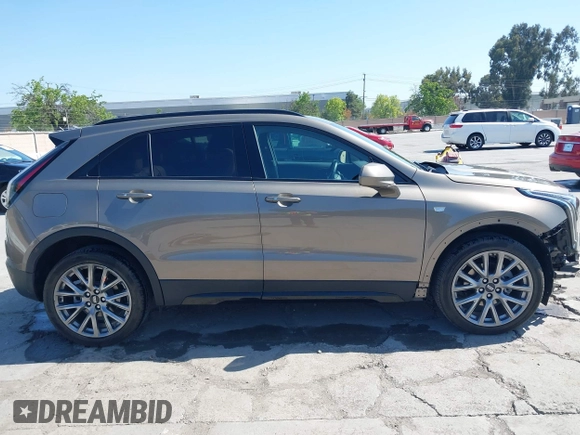 2020 Cadillac XT4 FWD Sport with VIN 1GYFZER4XLF032646, listed as a IAAI auction lot 42078928 with 11,987 mi miles and . Bid and sale history available at DreamBid. Image 14.