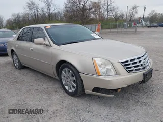 2009 Cadillac DTS w/1SA with VIN 1G6KD57Y29U137410, listed as a IAAI auction lot 42026044 with 112,916 mi miles. Bid and sale history available at carsss.com. Image 1.