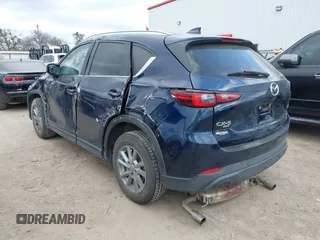 2023 Mazda CX-5 S Carbon Edition z VIN JM3KFBCM4P0288155, wystawiony jako IAAI lot #41501030 z przebiegiem 26 516 mil mil oraz . Historia ofert i sprzedaży dostępna na DreamBid. Obrazek 3.