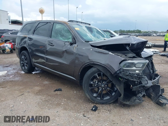2021 Dodge Durango R/T with VIN 1C4SDHCT9MC804058, listed as a IAAI auction lot 41908193 with 106,395 mi miles and . Bid and sale history available at DreamBid. Image 1.