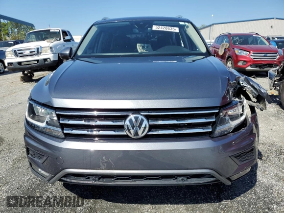 2020 Volkswagen Tiguan SE z VIN 3VV3B7AX8LM102502, wystawiony jako Copart lot #52428635 z przebiegiem 50 778 mil mil oraz Szkody całkowita. Historia ofert i sprzedaży dostępna na DreamBid. Obrazek 5.
