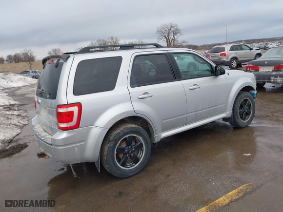 2011 Ford Escape XLT with VIN 1FMCU9D77BKC39013, listed as a IAAI auction lot 41637194 with 183,055 mi miles. Bid and sale history available at carsss.com. Image 4.