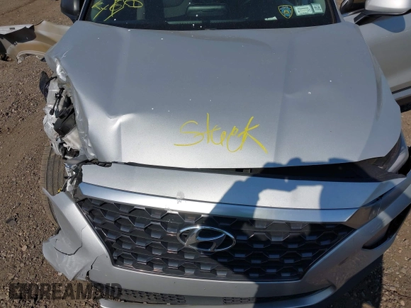 2019 Hyundai Santa Fe SE with VIN 5NMS23AD3KH102739, listed as a IAAI auction lot 42097252 with 116,023 mi miles and . Bid and sale history available at DreamBid. Image 10.