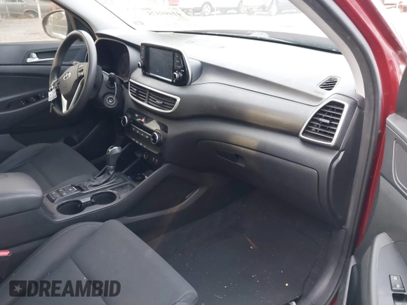 2019 Hyundai Tucson SE with VIN KM8J2CA49KU881841, listed as a IAAI auction lot 41099575 with 129,153 mi miles. Bid and sale history available at carsss.com. Image 5.