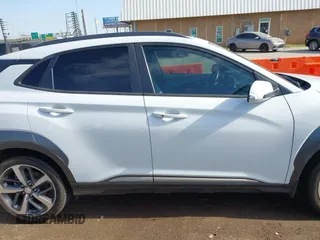 2019 Hyundai Kona Ultimate with VIN KM8K53A53KU373496, listed as a IAAI auction lot 42009405 with 69,206 mi miles and . Bid and sale history available at carsss.com. Image 13.