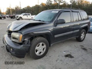 2003 Chevrolet TrailBlazer LT with VIN 1GNDS13S532288144, listed as a Copart auction lot 82968634 with 256,500 mi miles and Salvage Title. Bid and sale history available at DreamBid. Image 1.
