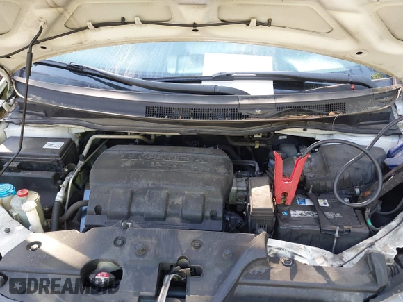 2014 Honda Odyssey EX-L with VIN 5FNRL5H63EB064854, listed as a IAAI auction lot 42102704 with 148,536 mi miles and . Bid and sale history available at carsss.com. Image 10.