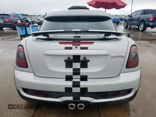 2015 MINI Coupe S z VIN WMWSX3C51FT409464, wystawiony jako Copart lot #60761415 z przebiegiem Nie podano mil oraz Czysty tytuł • Clean title. Historia ofert i sprzedaży dostępna na DreamBid. Obrazek 6.