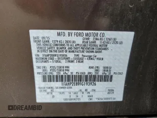2015 Ford Taurus SEL with VIN 1FAHP2E89FG193926, listed as a Copart auction lot 61036375 with 23,963 mi miles and Salvage title. Bid and sale history available at DreamBid. Image 12.