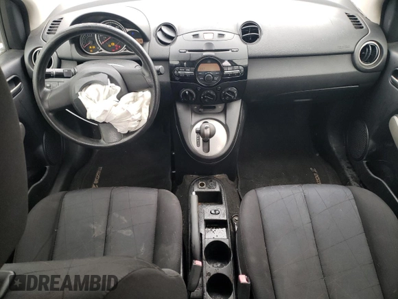 2012 Mazda 2 Sport with VIN JM1DE1KY1C0140803, listed as a Copart auction lot 83420714 with 153,730 mi miles and Salvage Title. Bid and sale history available at DreamBid. Image 8.