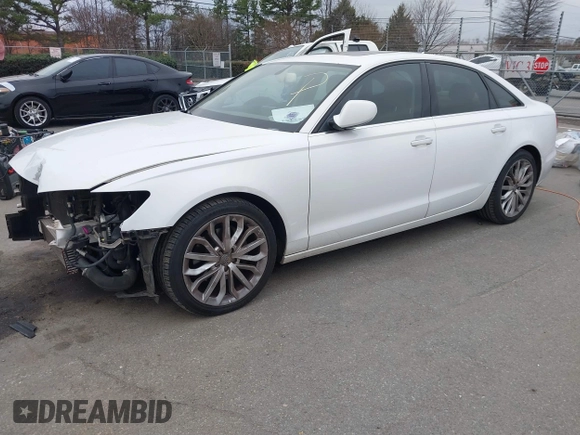 2013 Audi A6 Premium Plus with VIN WAUGFAFC6DN051237, listed as a IAAI auction lot 41553452 with 114,446 mi miles and . Bid and sale history available at DreamBid. Image 18.