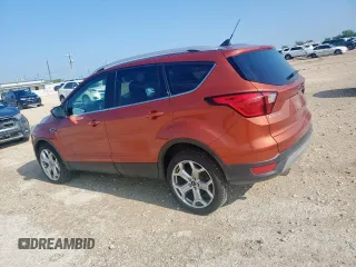 2019 Ford Escape Titanium с VIN 1FMCU9J95KUB54634, выставлен на аукционе Copart как лот 58171885 с пробегом 39 823 миль миль и Списание • Salvage title. История ставок и продаж доступна на DreamBid. Изображение 2.