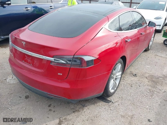 2013 Tesla Model S with VIN 5YJSA1CN9DFP09973, listed as a IAAI auction lot 41657188 with 61,546 mi miles. Bid and sale history available at carsss.com. Image 4.