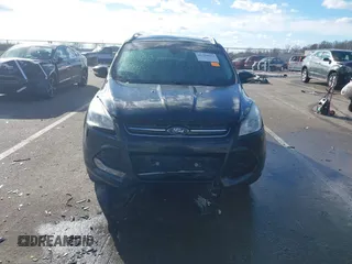 2015 Ford Escape Titanium with VIN 1FMCU0JX8FUC34459, listed as a IAAI auction lot 41394012 with 154,077 mi miles. Bid and sale history available at carsss.com. Image 6.