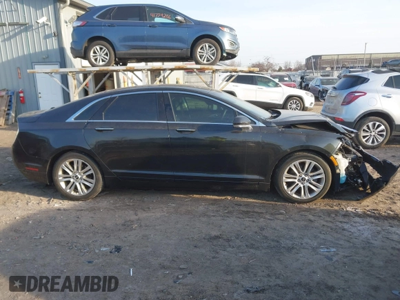 2015 Lincoln MKZ z VIN 3LN6L2J96FR619104, wystawiony jako IAAI lot #41794707 z przebiegiem 140 899 mil mil oraz . Historia ofert i sprzedaży dostępna na DreamBid. Obrazek 13.