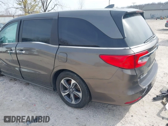 2018 Honda Odyssey Touring with VIN 5FNRL6H83JB008463, listed as a IAAI auction lot 41805044 with 65,001 mi miles. Bid and sale history available at carsss.com. Image 3.