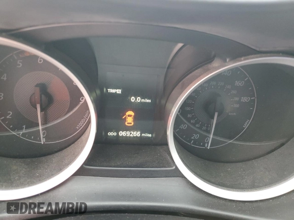 2015 Mitsubishi Lancer Evolution Final Edition z VIN JA32W7FV4FU027186, wystawiony jako Copart lot #87299484 z przebiegiem 69 266 mil mil oraz Szkoda całkowita • Salvage title. Historia ofert i sprzedaży dostępna na DreamBid. Obrazek 9.