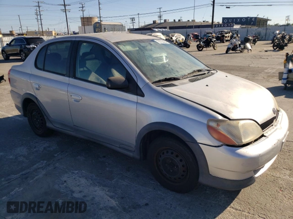 2002 Toyota ECHO with VIN JTDBT123025027203, listed as a Copart auction lot 70723424 with 187,299 mi miles and Salvage Title. Bid and sale history available at DreamBid. Image 4.