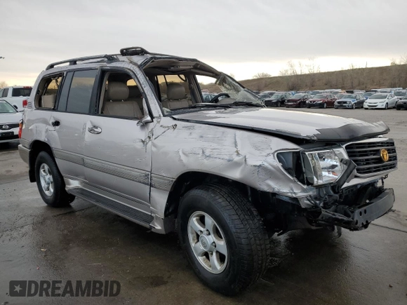 2000 Toyota Land Cruiser z VIN JT3HT05J4Y0088451, wystawiony jako Copart lot #52208905 z przebiegiem 329 751 mil mil oraz Nie do naprawy • Non repairable. Historia ofert i sprzedaży dostępna na DreamBid. Obrazek 4.