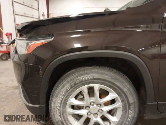 2019 Chevrolet Traverse LT Cloth z VIN 1GNERGKW1KJ158891, wystawiony jako IAAI lot #41996781 z przebiegiem 90 252 mil mil oraz . Historia ofert i sprzedaży dostępna na DreamBid. Obrazek 21.