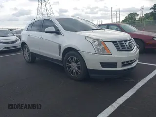 2014 Cadillac SRX Luxury Collection with VIN 3GYFNBE36ES519705, listed as a IAAI auction lot 42069288 with 211,632 mi miles and . Bid and sale history available at carsss.com. Image 1.