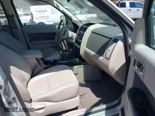 2009 Ford Escape Hybrid with VIN 1FMCU49309KC11542, listed as a IAAI auction lot 42028593 with 168,573 mi miles. Bid and sale history available at carsss.com. Image 5.