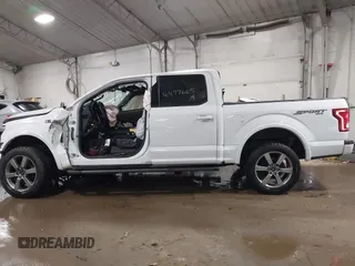 2015 Ford F-150 XLT with VIN 1FTEW1EP5FFB32595, listed as a IAAI auction lot 41477665 with 120,441 mi miles. Bid and sale history available at carsss.com. Image 14.