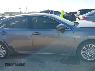 2014 Lexus ES 350 with VIN JTHBK1GG0E2127160, listed as a IAAI auction lot 41671108 with 130,255 mi miles. Bid and sale history available at carsss.com. Image 13.