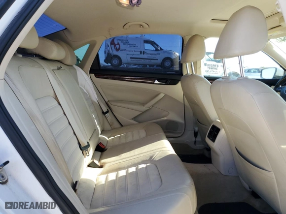 2013 Volkswagen Passat SEL Premium with VIN 1VWCM7A32DC063332, listed as a Copart auction lot 77217544 with 104,534 mi miles and Salvage Title. Bid and sale history available at carsss.com. Image 10.