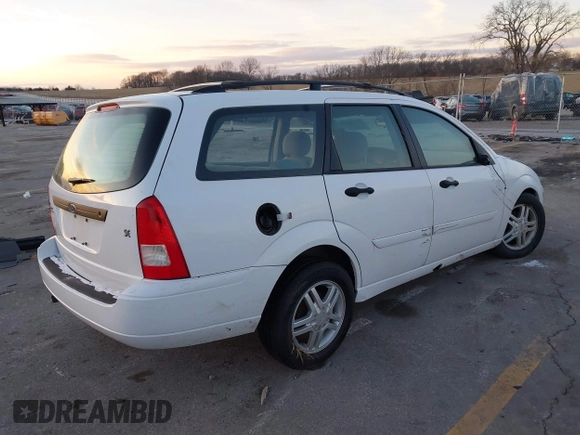 2001 Ford Focus SE with VIN 1FAFP36341W164123, listed as a IAAI auction lot 41143386 with 107,477 mi miles and . Bid and sale history available at carsss.com. Image 4.