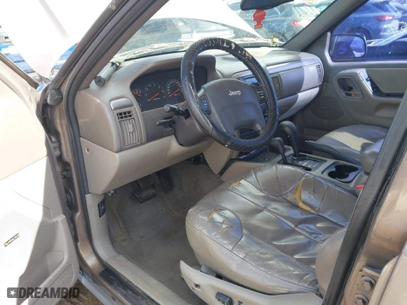 2001 Jeep Grand Cherokee Laredo with VIN 1J4GW48S21C572272, listed as a IAAI auction lot 41695754 with 169,229 mi miles. Bid and sale history available at carsss.com. Image 5.