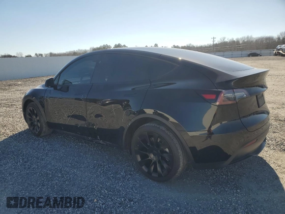 2023 Tesla Model Y Long Range with VIN 7SAYGDEE5PF892285, listed as a Copart auction lot 46458635 with 39,951 mi miles and Salvage Title. Bid and sale history available at DreamBid. Image 2.