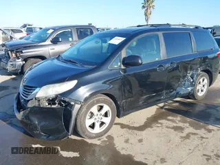 2015 Toyota Sienna LE AAS with VIN 5TDKK3DC2FS615423, listed as a IAAI auction lot 42218623 with 232,838 mi miles and . Bid and sale history available at DreamBid. Image 2.