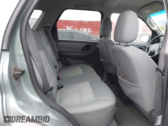 2006 Ford Escape XLT with VIN 1FMYU03126KC55897, listed as a IAAI auction lot 41733243 with 136,989 mi miles. Bid and sale history available at carsss.com. Image 8.