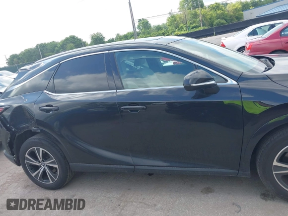 2023 Lexus RX 350 z VIN 2T2BAMCA9PC034273, wystawiony jako IAAI lot #42653429 z przebiegiem 29 826 mil mil oraz . Historia ofert i sprzedaży dostępna na DreamBid. Obrazek 13.
