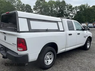 2023 Ram 1500 Tradesman with VIN 1C6RR7FT4PS588854, listed as a Copart auction lot 64556685 with 24,403 mi miles and Salvage title. Bid and sale history available at DreamBid. Image 4.