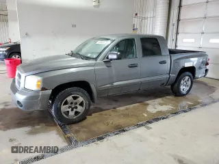2005 Dodge Dakota SLT z VIN 1D7HW48N95S166589, wystawiony jako Copart lot #54868565 z przebiegiem 228 682 mil mil oraz Szkoda całkowita • Salvage title. Historia ofert i sprzedaży dostępna na DreamBid. Obrazek 1.