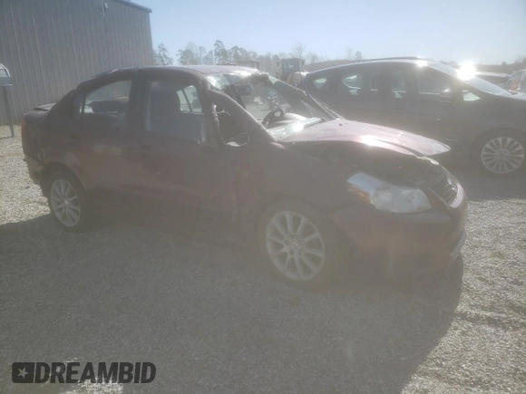 2011 Suzuki SX4 LE with VIN JS2YC5A21B6303222, listed as a Copart auction lot 50426895 with 56,236 mi miles and Salvage Title. Bid and sale history available at carsss.com. Image 4.