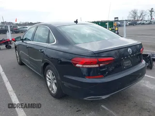 2020 Volkswagen Passat 2.0T SE with VIN 1VWSA7A32LC008611, listed as a IAAI auction lot 41912651 with 104,014 mi miles. Bid and sale history available at carsss.com. Image 3.