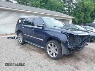 2018 Cadillac Escalade Luxury z VIN 1GYS4BKJ7JR103910, wystawiony jako IAAI lot #42606512 z przebiegiem 151 065 mil mil oraz . Historia ofert i sprzedaży dostępna na DreamBid. Obrazek 1.