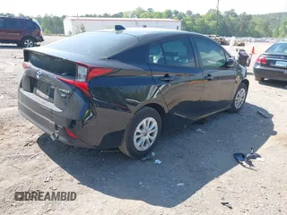 2022 Toyota Prius L Eco with VIN JTDKAMFU1N3182790, listed as a IAAI auction lot 41993264 with 124,777 mi miles and . Bid and sale history available at DreamBid. Image 4.