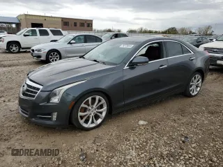 2013 Cadillac ATS Performance z VIN 1G6AJ5S34D0139059, wystawiony jako Copart lot #79273044 z przebiegiem 134 131 mil mil oraz Szkody całkowita. Historia ofert i sprzedaży dostępna na DreamBid. Obrazek 1.