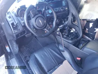 2015 Jaguar F-Type R z VIN SAJWA6DA2FMK13208, wystawiony jako Copart lot #88416875 z przebiegiem Nie podano mil oraz Szkody całkowita. Historia ofert i sprzedaży dostępna na DreamBid. Obrazek 8.