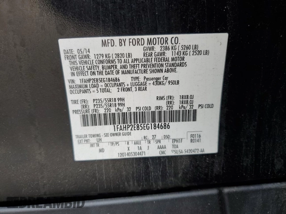 2014 Ford Taurus SEL z VIN 1FAHP2E85EG184686, wystawiony jako Copart lot #55862775 z przebiegiem 238 217 mil mil oraz Czysty tytuł • Clean title. Historia ofert i sprzedaży dostępna na DreamBid. Obrazek 12.