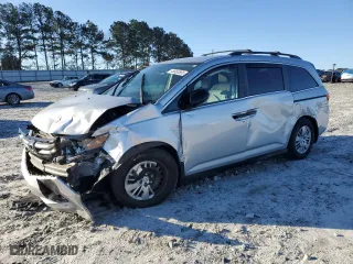 2014 Honda Odyssey LX with VIN 5FNRL5H27EB039999, listed as a Copart auction lot 48950565 with 121,740 mi miles and Salvage Title. Bid and sale history available at carsss.com. Image 1.